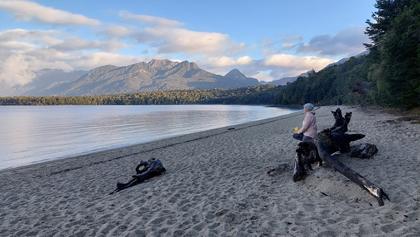 Debbie enjoying Lake Manapouri (this is right beside Moturau Hut)