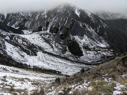 Looking back at the new lake from just below the Stace Saddle. Notice the deep gorge carved by the river through the basin below – access past this is is via a small slip to the bottom right corner of the photo (hidden by the slope)