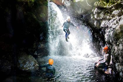 Jumping into a pool in Chamberlain Creek, Tararua Range