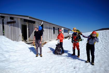 People standing outside the WTMC Lodge