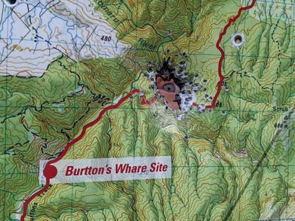 Map board with shotgun holes