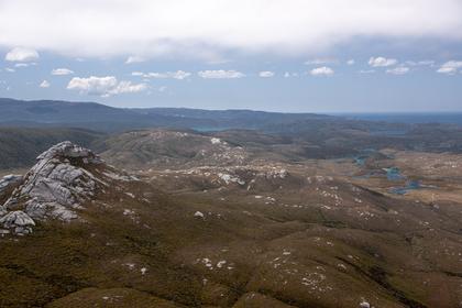 On the summit of Gog. Magog left, Cook Arm right, the Tin Range distant left skyline