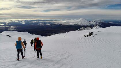 Heading down to the lodge before the clouds catch up
