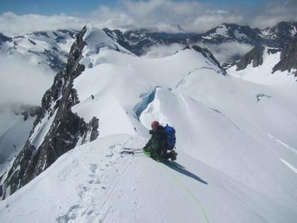 Nick J preparing to descend the steepest section of Hochstetter’s SE ridge, with Nick H and Elisabet below (credit Henry)