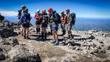 Standing on the summit of Mt Taranaki (Taranaki Maunga).