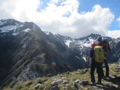 Nick H and Elisabet look back up the Sebastapol ridge, with the summit of Mt Annette teasing us from the top (we reckon we got close enough to claim it!), and Mt Kitchener off to the right (credit Henry)