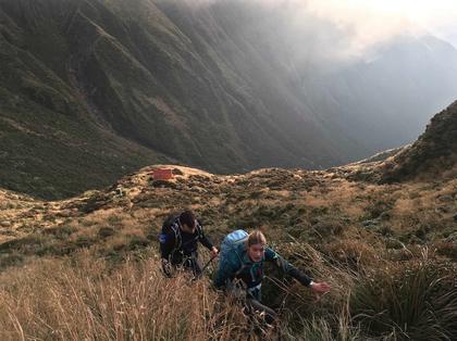 Beginning the ~200m climb back to the ridge line from Dundas Hut