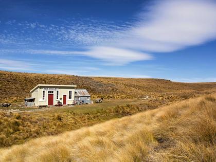 Taking a break at the Ida Valley Hut - once a railway station building