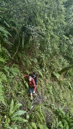 Daniel scrambles along the narrow track